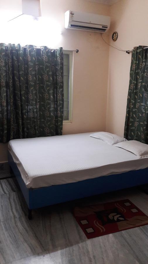 Shanti Guesthouse Bhubaneswar Værelse billede